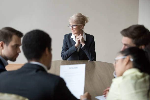 Woman passing job interview in the office at boardroom stock photo