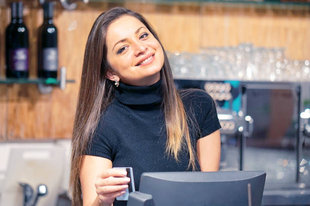 istock The barman at the cash register 1050289028