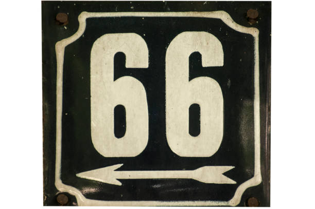 istock Weathered enameled plate number 66 1050290486