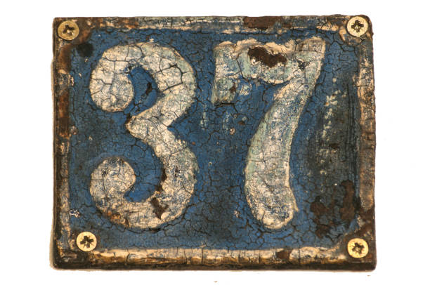 istock Old retro cast iron plate number 37 1050290562