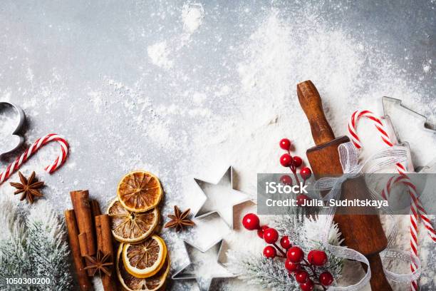 Bakery Background For Cooking Christmas Baking With Rolling Pin Scattered Flour And Spices Decorated With Fir Tree Top View Stock Photo - Download Image Now