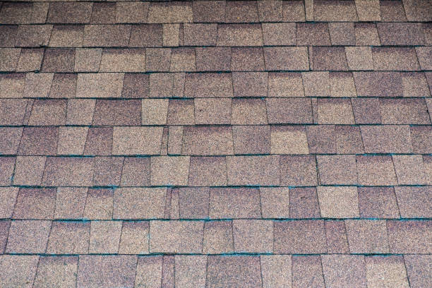 istock Stacked granite brown roof background 1050304582