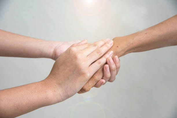 istock Hand hold togethet in team for success something or take care. 1050307330