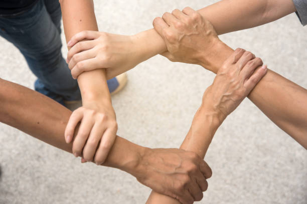 istock Hand hold togethet in team for success something or take care. 1050307332