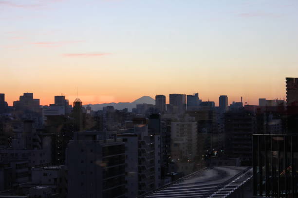 istock Mt. Fuji seen from between the buildings 1050319026