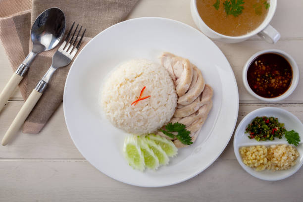 istock Hainanese chicken rice on the table 1050319500