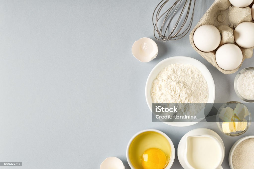 Background with ingredients for cooking, baking Background with ingredients for cooking, baking, flat lay, top view. Cake Stock Photo
