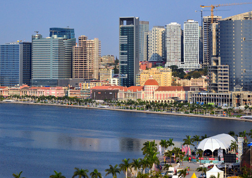 Luanda, Angola: the corniche - panorama of the waterfront avenue, Avenida Marginal / 4 de Fevereiro - downtown Luanda has a mix of colonial architecture and modern glass clad high-rise buildings - Luanda Bay, Atlantic Ocean - Ingombota  (multiple small logos, compatible with Getty guidelines, article 1736)