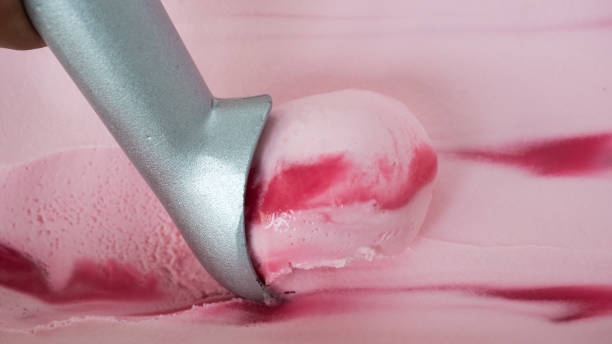 istock Ice cream scoop close up Strawberry Twist 1050346194