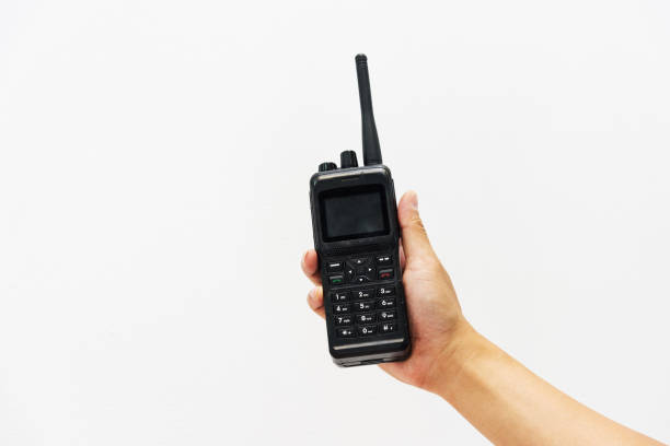 Hand holding radiotelephone walkie talkie