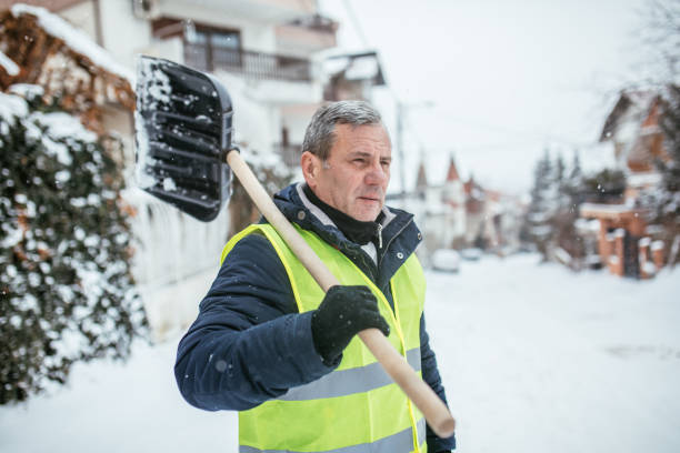 istock Mature man going to clean snow 1050352414