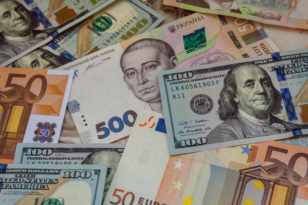 istock Money banknotes of different countries on the table 1050358986