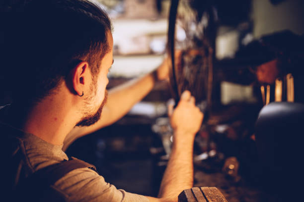 istock Man in repair shop 1050362208