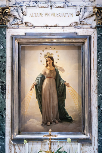 Rome, Italy - September 6, 2018: Church of Sant'andera delle Fratte, this painting represents the Holy Mother as appeared to the young Ebrew who believed and converted to the Christian faith. Painted by Natale Carta (1800-1880).
