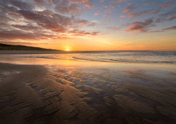 istock Sunrise on Maasvlakte beach in the Netherlands 1050380044