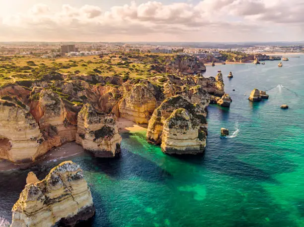 Beach Ponta da Piedade aerial view in a sunny day in Algarve region, Portugal