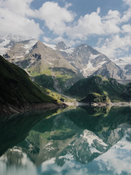 istock Austrian Alpes in the summer. Green mountains 1050393130
