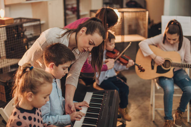istock Kids in music school 1050399248