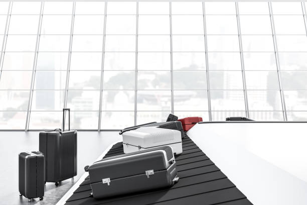 istock Large window airport with conveyor belt 1050407274