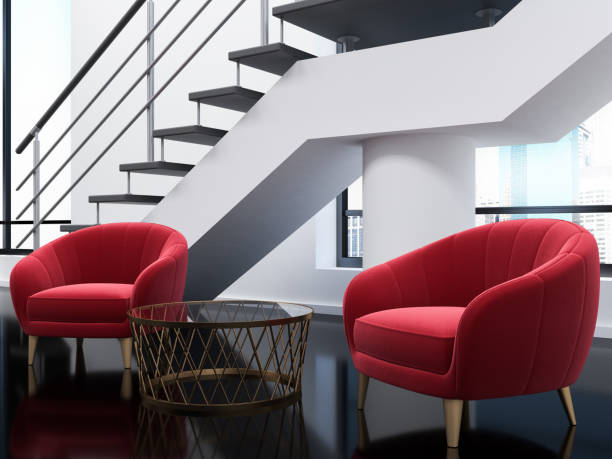 istock White office waiting area, red armchairs 1050407622