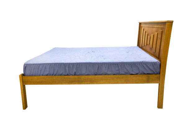 istock wooden double bed isolated on white background 1050414198
