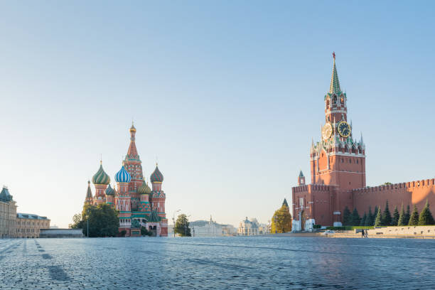 istock St. Basil's Cathedral and Spasskaya Kremlin Tower on Red Square 1050416394
