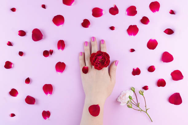 istock beauty hands with makeup flowers 1050420492