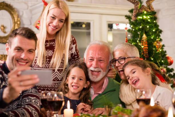 istock Multi-generation family taking selfie together 1050429112