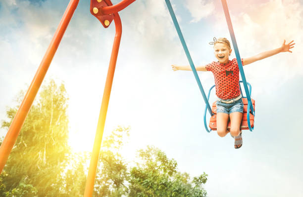 istock Little girl swing on swing 1050437212