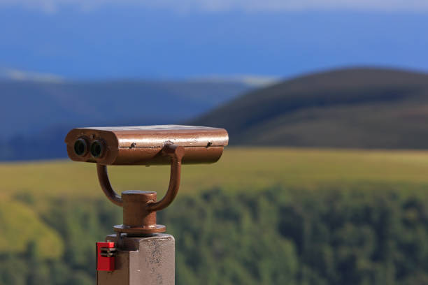istock Binoculars on a viewing platform for observing flora, fauna and landscape. 1050449254