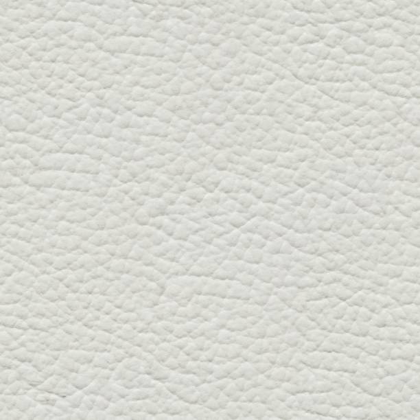 istock Gentle white leather background for your new style. 1050463894