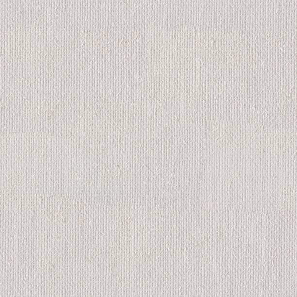 istock Canvas texture coated by white primer. Seamless square texture. 1050463960