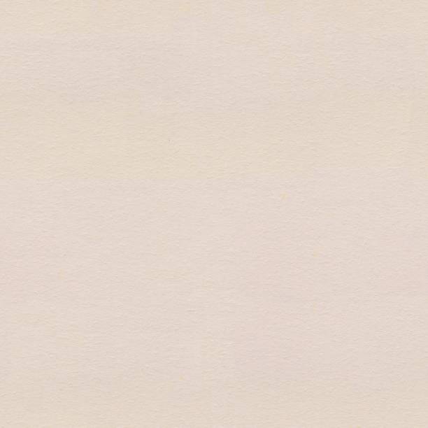 istock Beige handmade paper texture. Seamless square background,, tile ready. High quality texture in extremely high resolution. 1050466036