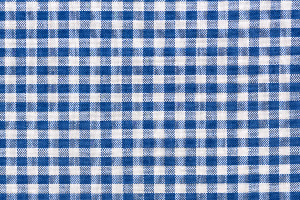 istock Blue checkered rural tablecloth background. High resolution photo. 1050466176