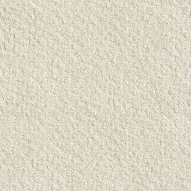 istock Paper texture background in light cream tone. Seamless square texture. Tile ready. 1050466320