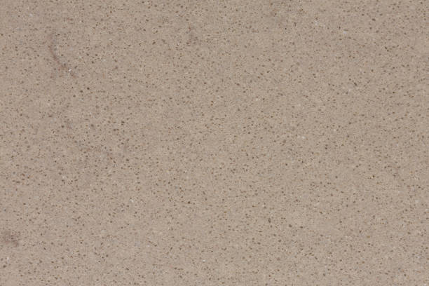 istock Usual synthetic rock background in light hue. 1050466372
