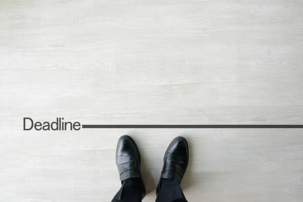 istock Business man standing on deadline 1050477226