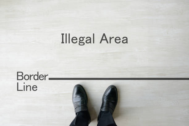 istock Business man standing on border line 1050478246