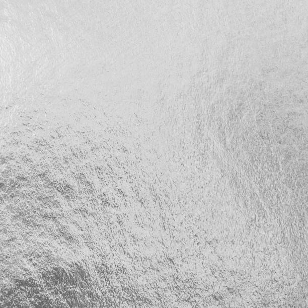 istock Silver foil shiny metal texture background wrapping paper for wallpaper decoration element 1050481656