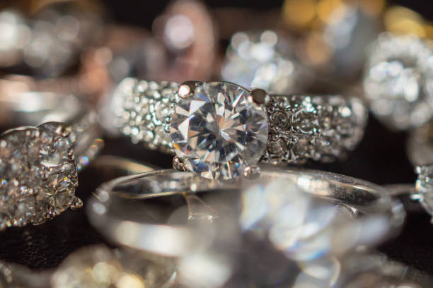 istock Jewelry diamond rings set on black background close up 1050481788