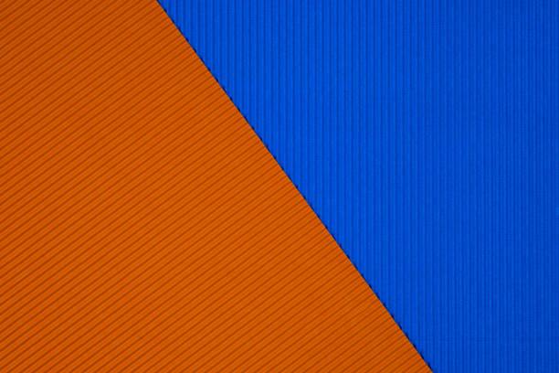 Blue and orange corrugated paper texture, use for background. vivid colour with copy space for add text or object.