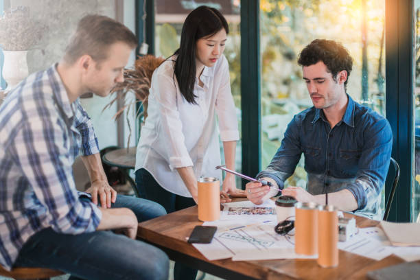 istock creativity brainstorm ideas concept with business partnet meeting workshop in coffeeshop and reflect of garden on window 1050482330