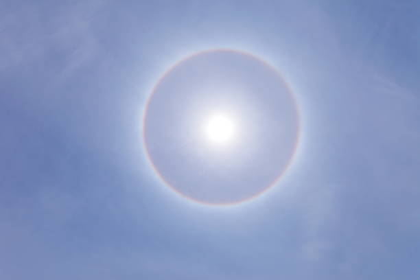 istock Stunning sun halo with deep blue sky on sunny day 1050485080