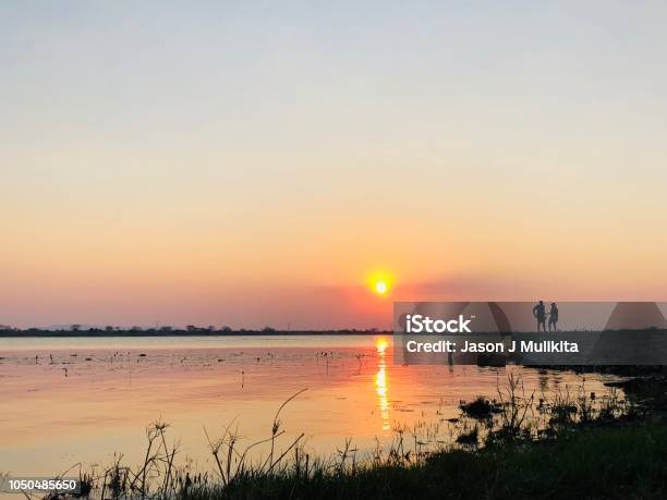 Kafue River Sunset Stock Photo - Download Image Now - Beach, Beauty In Nature, Cloud - Sky