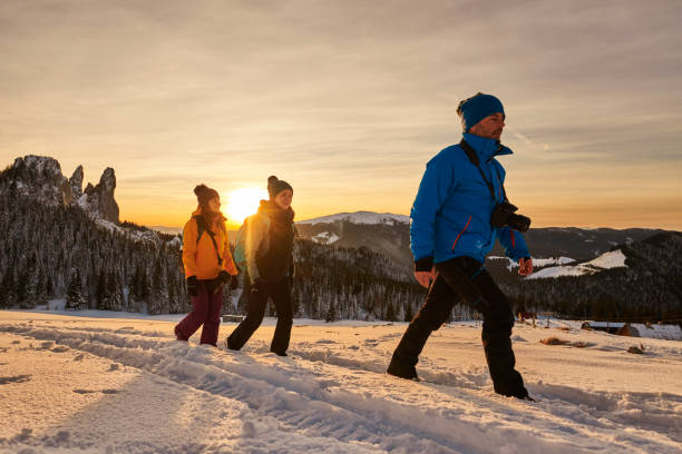 istock active hiking friends in the winter 1050492704