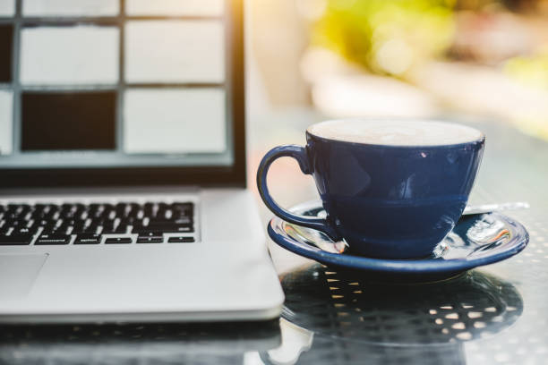 istock laptop on table in coffee shop 1050498034