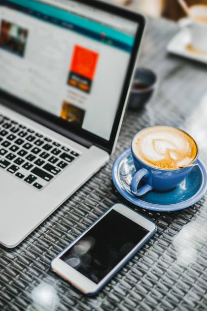 istock laptop on table in coffee shop 1050498130