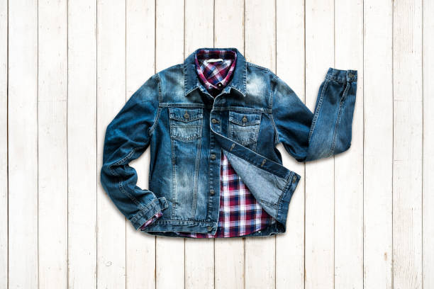 istock Checkered shirt in denim jacket outfit flat lay 1050508056