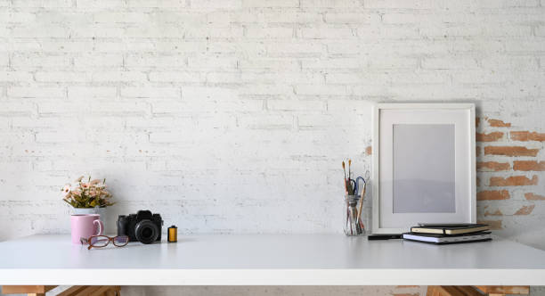 istock Loft wood workplace mockup poster and copy space 1050513934
