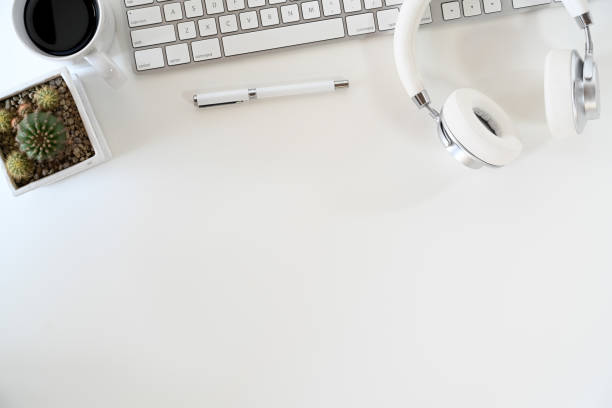 istock Top view work desk space office supplies and copy space 1050513982